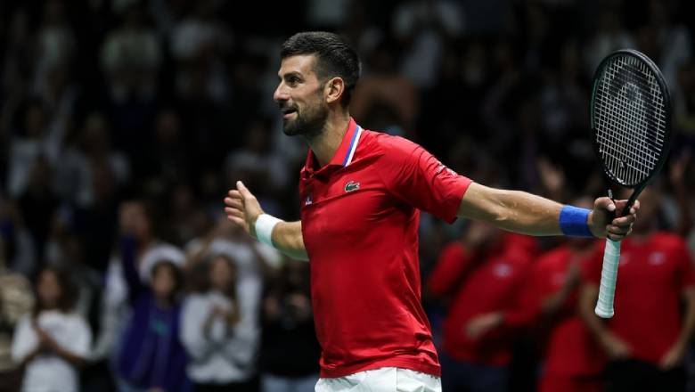 Djokovic won both men's and men's double matches, helping Serbia win the Davis Cup - Photo 1